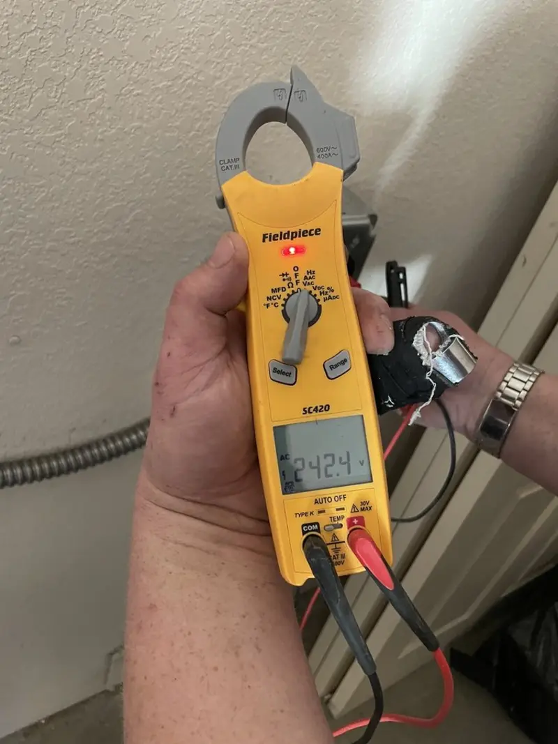 Voltage testing with clamp meter during Outlet Installation in Sumter